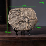 squelette dinosaure résine décor maison salle gris marron clair os roche tringle noire réaliste