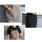 tablier coton polyester uni noir gris beige classique poche avant écrous métalliques