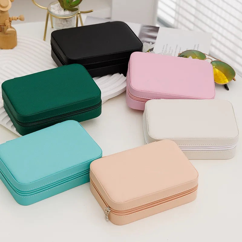 boîte bijoux simili cuir moderne compartiments fermeture glissière beige noir vert rose