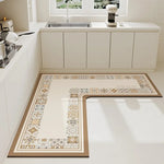 Carrelage au sol de style vintage avec un motif décoratif et des couleurs neutres dans une cuisine moderne et épurée.