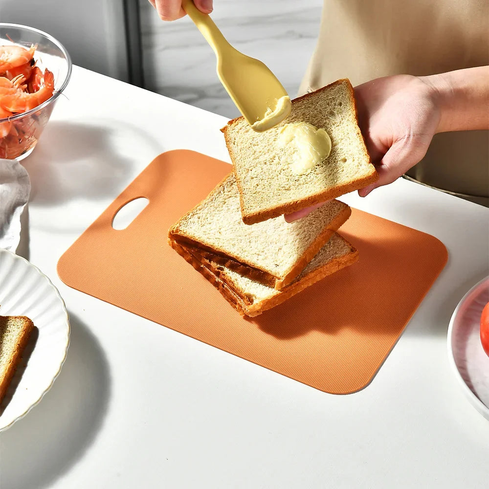 planches découper plastique vert orange gris moderne couteau oignon tomate romarin avocat citron