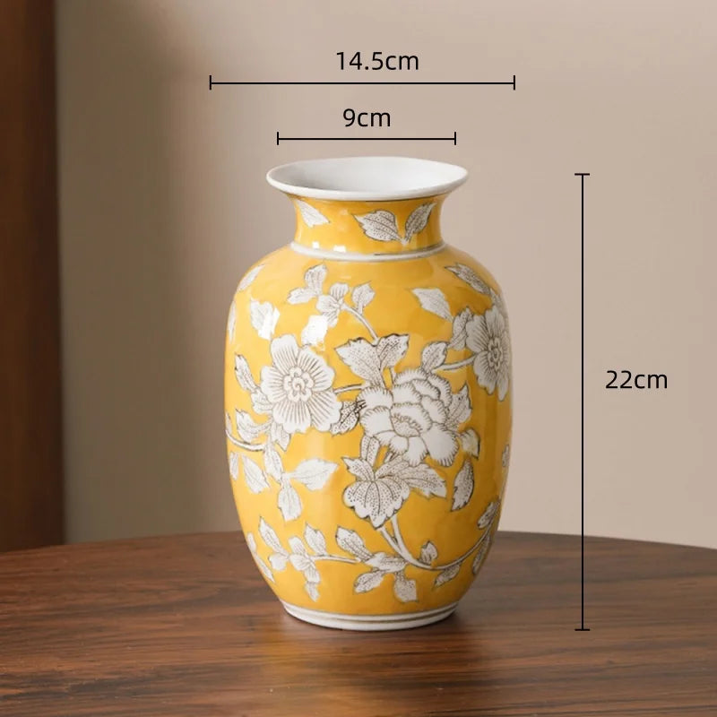 vase porcelaine chinois blanc bleu fleurs feuilles oiseaux géométrique classique floral table decoration