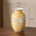 vase porcelaine chinois blanc bleu fleurs feuilles oiseaux géométrique classique floral table decoration
