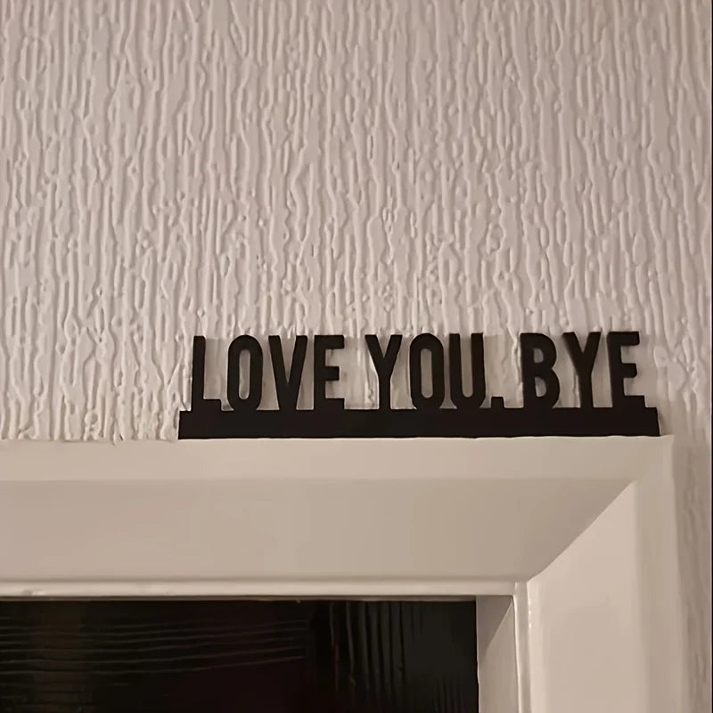 décoration murale plaque minimaliste LOVE YOU BYE noir lettres blanches salon contemporain sans électricité