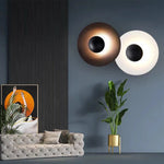 applique murale contemporaine dorée noire led fixée mur ronde lisse