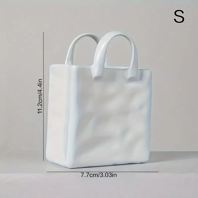vase résine forme sac main blanc texture cuir moderne décoration table fleurs séchées minimaliste