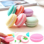 boîtes rangement forme macaron couleurs vert orange rose jaune créatif ludique capsules blanches vertes