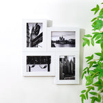 Cadre photo mural multi-ouverture 4x6 en bois noir avec des photos en noir et blanc