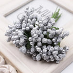 décoration intérieure bouquets artificiels fleurs boutons modernes variées feuilles vertes