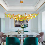 suspension lumineuse moderne dorée branches pierres couleur blanc orange vert
