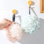 boule bain texture maille couleur beige rose vert moderne anneau noir panier blanc