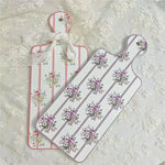 planche découper céramique vintage fleurs roses motifs géométriques blanc roseclair