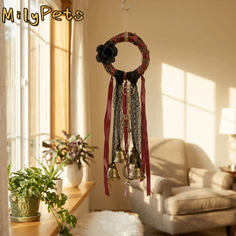 décoration boho chic couronne osier fleurs noires rubans dentelle cloches dorées porte