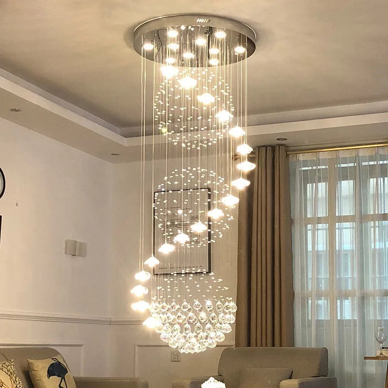 Suspension lumineuse moderne cristal transparente salon chambre étude 2000 82000 flux lumineux