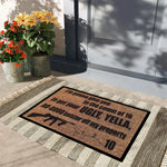 tapis porte antidérapant motif arme feu humoristique couleur marron noir gris blanc