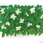 plantes artificielles feuilles vertes fleurs violettes roses blanches moderne décoration intérieure