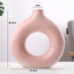 vases modernes roseclair beige noir bougies fleurssséchées décorationintérieure texturegrained minimaliste setdeco