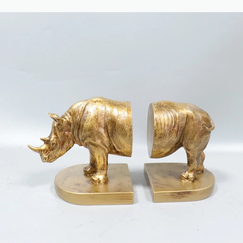 serre livres rhinocéros doré texture vieillie décoration animalier deux pièces