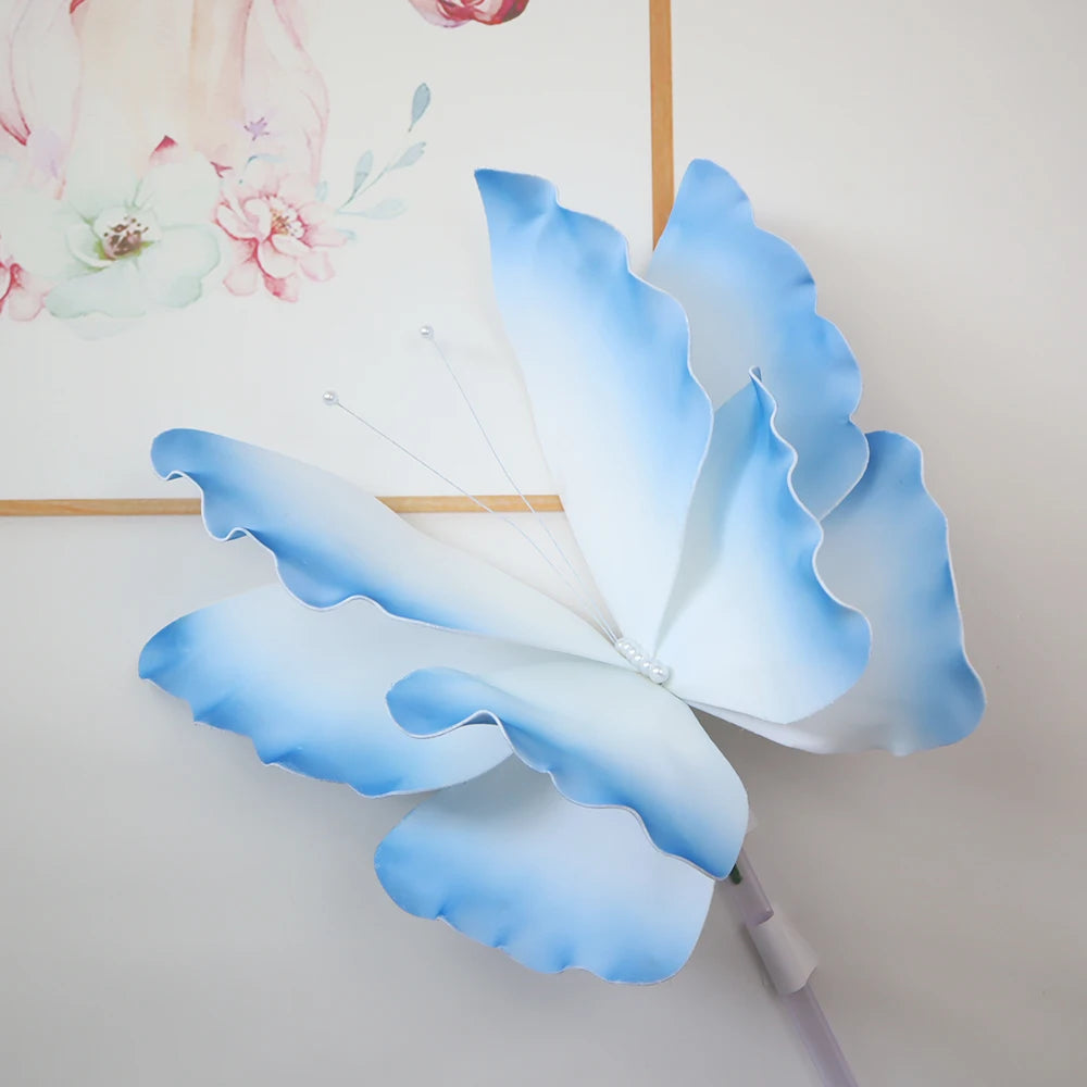 décoration événement papillon bleu rose vert réaliste détails fins tringle support anniversaire mariage fête