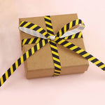 ruban tissé polyester noir jaune rayures diagonales classique adhésif décoration emballage cadeau bricolage artisanal