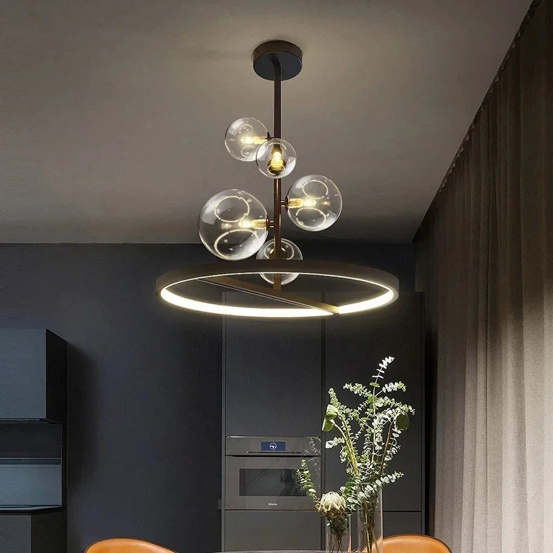 suspension lumineuse moderne sphères verre transparent anneaux métalliques noir doré grisclair