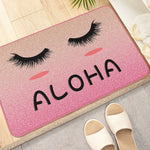 tapis d'entrée moderne yeux poupée welcome chiens os noir roseclair blanc