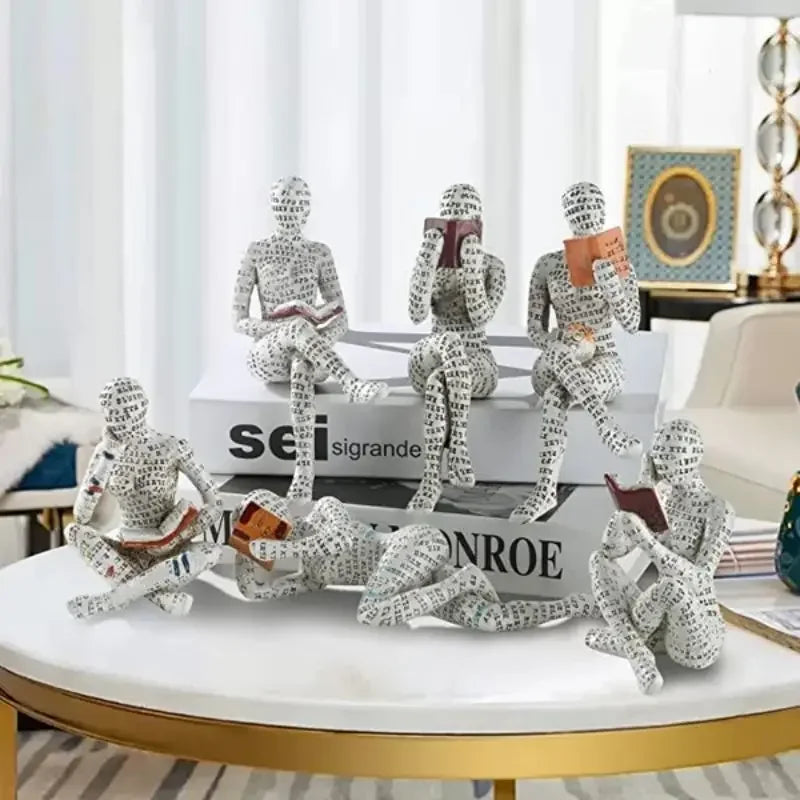 statue résine femme lisant livres colorés art contemporain blanc opalescent pensé thème humains