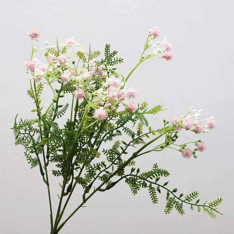 décoration intérieure bouquet artificiel feuilles vertes fleurs blanches jaunes roses naturel salon jardin