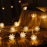 guirlande lumineuse fleurs colorées jardin nocturne décoration extérieure féerique chaleureuse led festive
