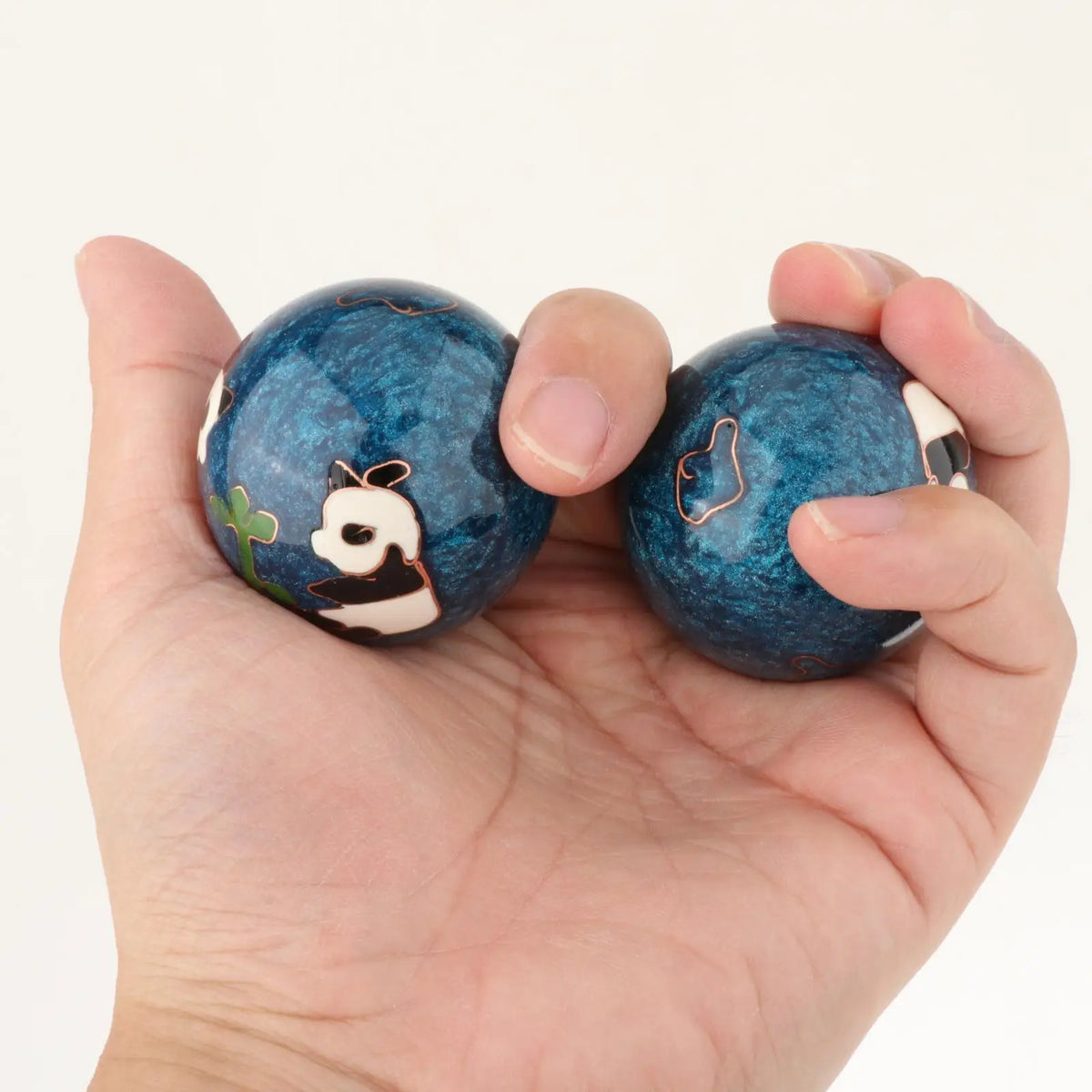 boules massage main rouge panda feuille fitness relaxation santé exercices dextérité portable
