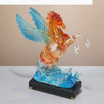 statuette pegase cheval ailé vague transparente bleu orange décoration maison festive