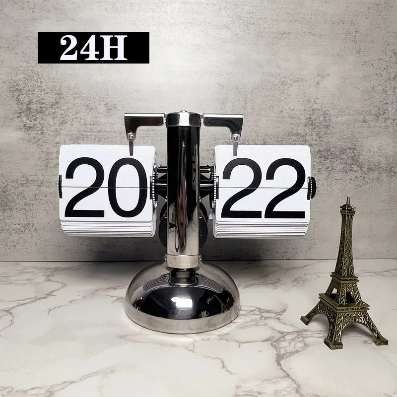 horloge cadran rotatif vintage noir blanc rétro pied circulaire chiffres noirs fond blanc