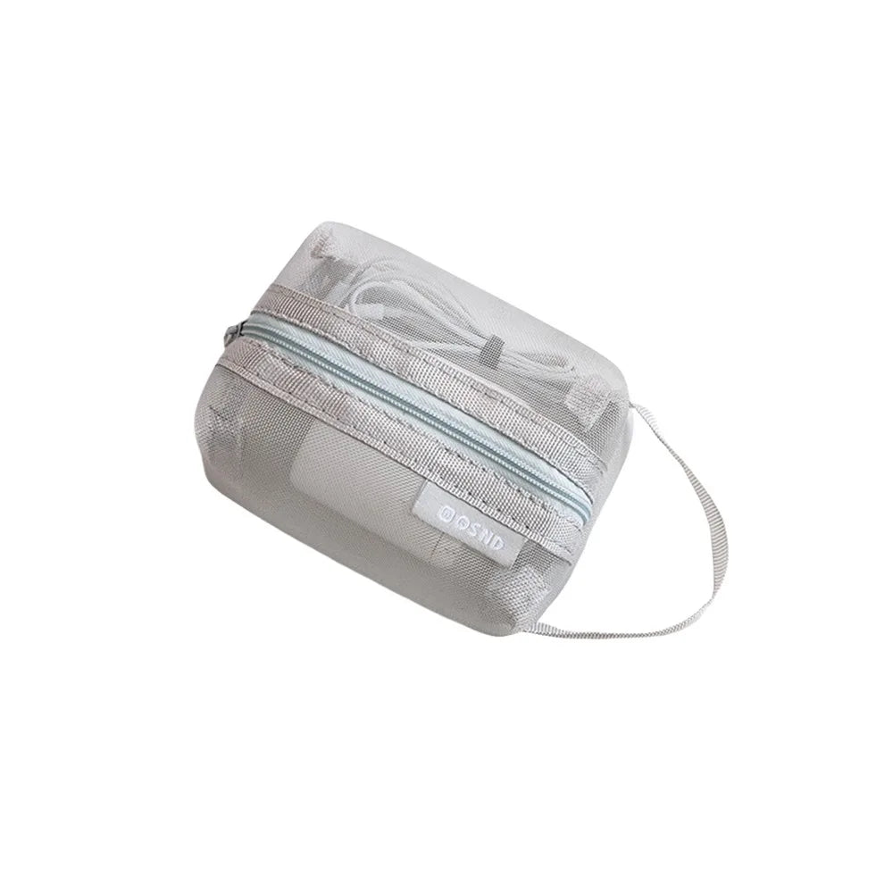 sac main vert maille moderne fermeture eclaire rangement chargeur cable boite données