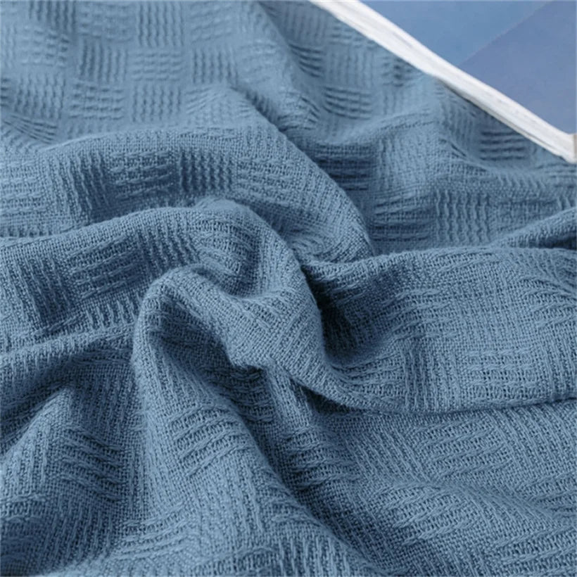 couverture coton tricotée motif géométrique bleu gris jaune canapé lit maison voyage été