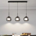 suspension lumineuse moderne sphères transparentes noir led salon salle manger éclairage intérieur
