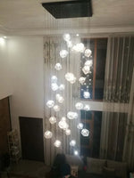 lustre moderne blanc transparent cubes géométriques suspension câbles blancs lumière chaude lumière froide 30w