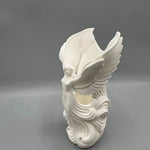vase decoratif ange blanc art deco ondulations ailes deployees table fleurs objetos