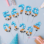 bougies numérotées anniversaire dessin animé motif animalier vache nuages carreaux