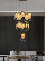 suspension lumineuse moderne transparent dorée fine élégante chaînes métalliques ampoules incluses