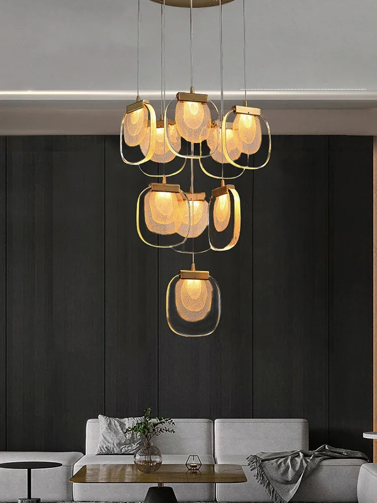 suspension lumineuse moderne transparent dorée fine élégante chaînes métalliques ampoules incluses