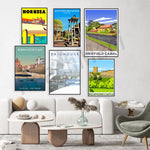 Cette image présente une collection d'affiches vintage mettant en valeur diverses destinations et attractions du Royaume-Uni, créant ainsi un environnement décoratif et inspirant dans un salon moderne.