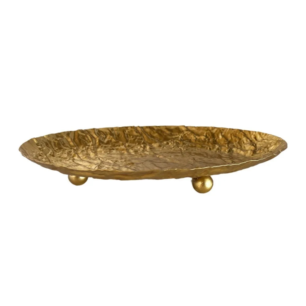 plateau decoratif or texturé moderne pieds sphères objets organisation table thé cartes lunettes montre