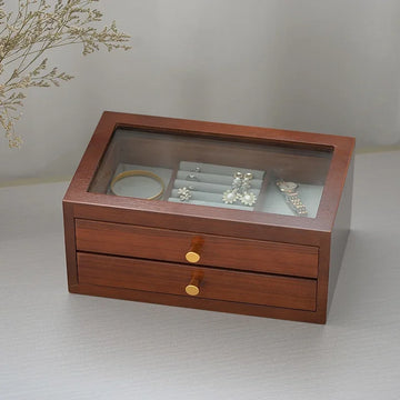 boîte bijoux marron foncé verre transparent poignées dorées classique envelloppe présente bijoux faux daim