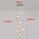 Suspension lumineuse moderne dorée noir formes géométriques brillantes salon chambre