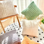coussins décoratifs modernes texture duveteuse motifs rectangles couleurs vert menthe beige rose blanc gris