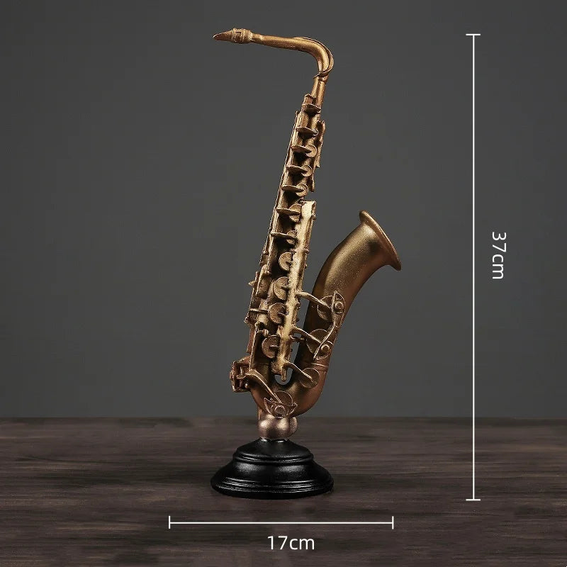 statues ornementales violon saxophone or vieilli noir imitation bois vintage decoration maison hauteur largeur
