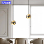 lampes suspendues moderne pierre marbre jaune blanc gris salle chambre semi transparent anneaux métalliques