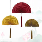éventail pliant décoratif papier rouge bleu marine doré chinois traditionnel pompon cordelette