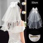 voile mariée blanc translucide détails floraux classique clips inclusion élégant