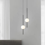suspension luminaire moderne sphères translucides métal noir or chambre salon intérieur maison